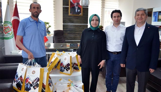 BİR YETİMDE SEN GİYDİR