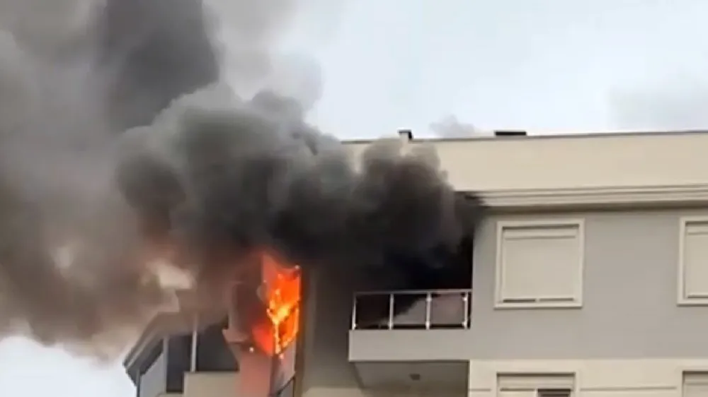 Evi ateşe veren kiracı kaçtı